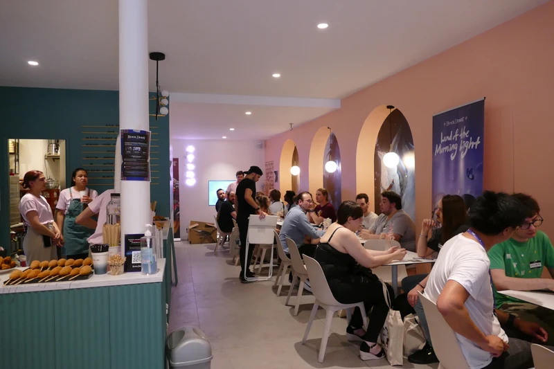 Black Desert community gathering inside a themed cafe
