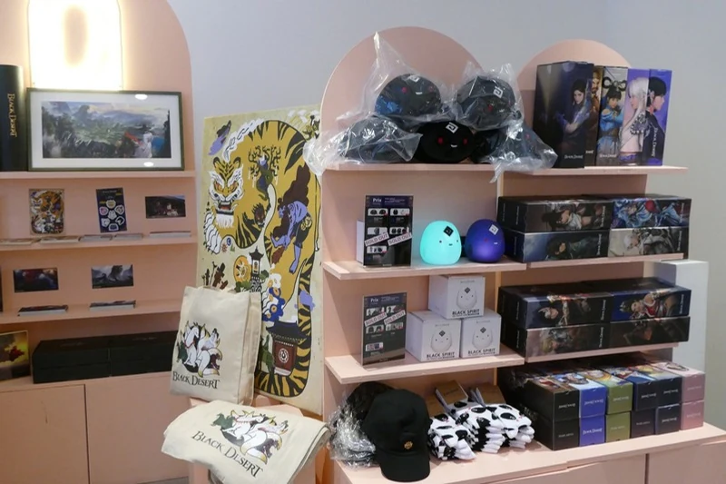 Black Desert merchandise arranged inside the cafe