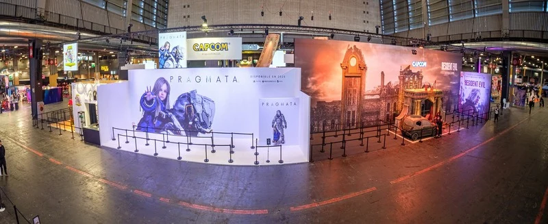 Overview of Capcom's booth with dedicated game environments