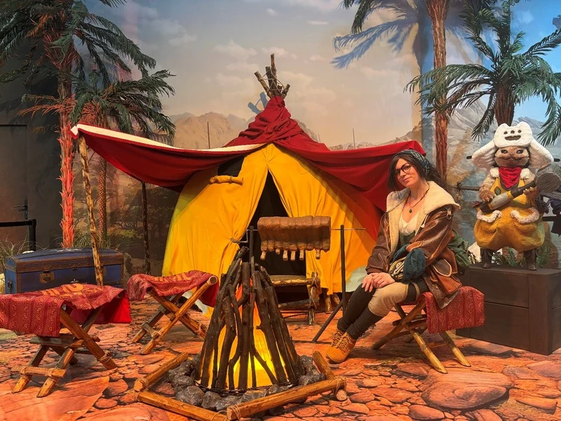 Monster Hunter campsite with a tent and game characters
