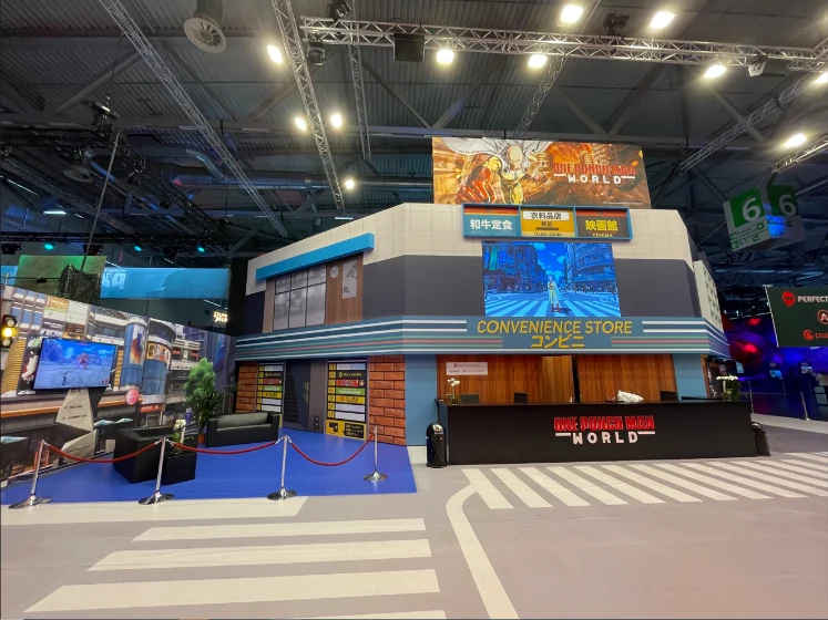 One Punch Man: World booth with its urban storefront scenery