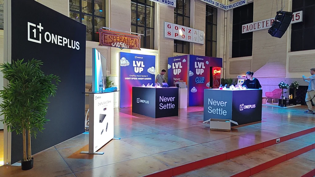 OnePlus pop-up store with illuminated smartphone demonstration counters