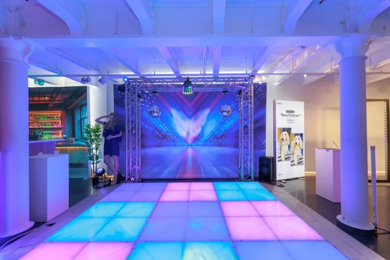 OPPO Reno13 illuminated dancefloor and experiential event space