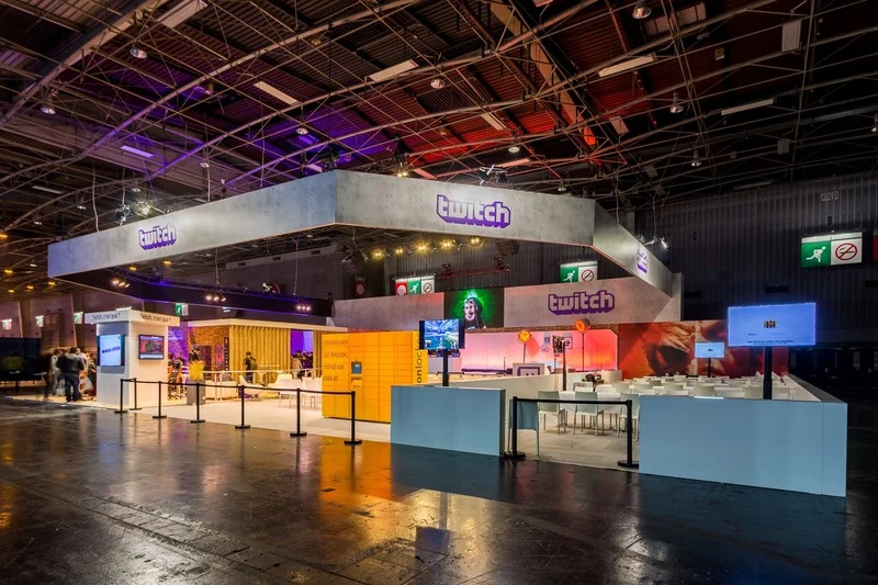 Twitch booth with a two-level structure and distinct visitor areas