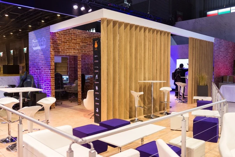 Twitch hospitality and meeting area with purple and timber details