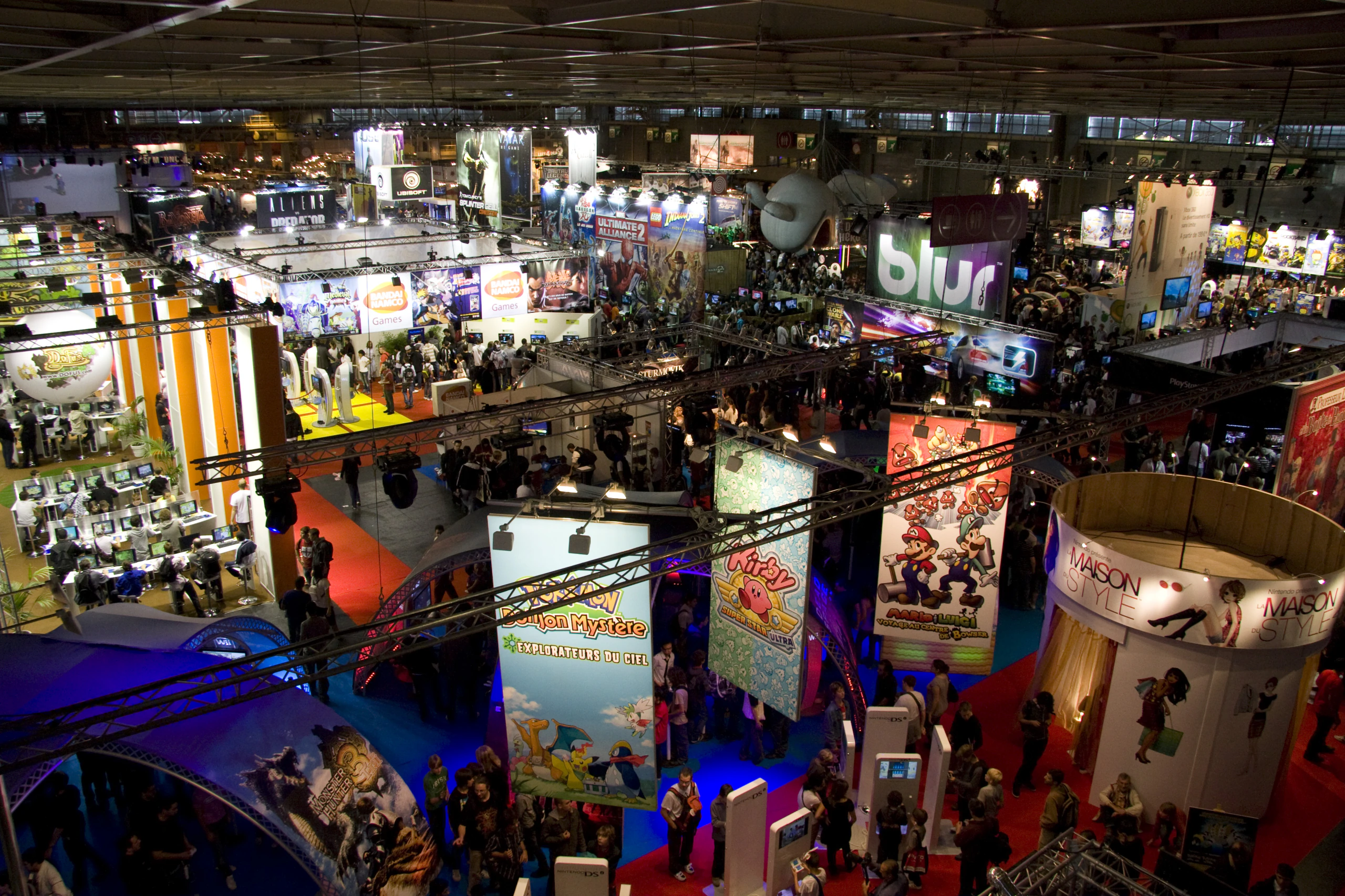 Exhibition stands and visitors at a gaming trade show